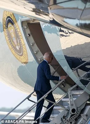 President Joe Biden taking the shorter stairs