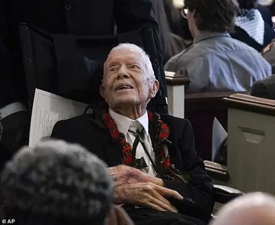 Jimmy Carter, 99, was last seen publicly at his wife Rosalynn's funeral in November 2023 (pictured) – and he has been receiving hospice care since February 2023 at his home in Plains, Georgia