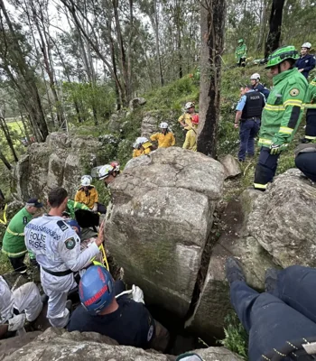 A huge rescue team rushed to save the woman who was trapped in the tight space