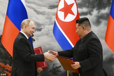 The troops were promised to Vladimir Putin by the country¿s president Kim Jong-un during a state visit to Pyongyang. Pictured: Russian President Vladimir Putin, left, and North Korea's leader Kim Jong Un during a signing ceremony of the new partnership in Pyongyang, North Korea, on June 19, 2024