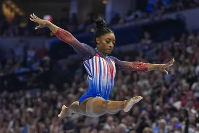 Simone Biles competes on the balance beam at the United States Gymnastics Olympic Trials on Sunday, June 30, 2024, in Minneapolis. AP PHOTO