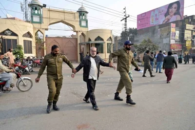 Police arrest a PTI supporter in Lahore