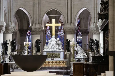 The altar designed by French artist and designer Guillaume Bardet is seen in the heart of Notre-Dame de Paris cathedral while French President Emmanuel Macron visits the restored interiors of the monument, Friday Nov. 29, 2024, in Paris. (Stephane de Sakutin, Pool via AP)