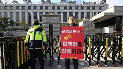 South Korea's Yoon resists questioning over failed martial law bid