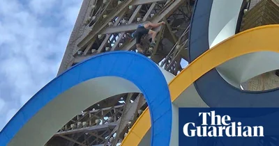 ‘Bloody warm, innit?’ says man who climbed Eiffel Tower on last day of Olympics