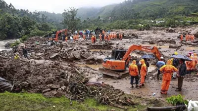 This photograph provided by National Disaster Response Force (NDRF) shows rescuers at a spot after a landslide in Wayanad, southern Kerala state, India, Tuesday, July 30, 2024. PHOTO BY NDRF VIA AP