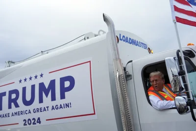 Trump boards a garbage truck to draw attention to Biden remark