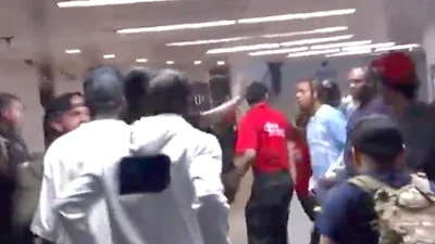 Boxer Keyshawn Davis ‘escorted out by police after backstage brawl caught on camera with his brother’s opponent’