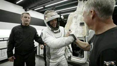 In this image made from SpaceX video, tech entrepreneur Jared Isaacman (center) greets as he gets out of its capsule upon his return with his crew after the capsule landed in the Gulf of Mexico near Florida's Dry Tortugas early Sunday, Sept. 15, 2024. SPACEX VIA AP 