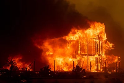 Wind-fanned wildfire burning out of control near Los Angeles