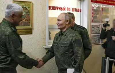 Putin Dons Military Uniform, Demands 'Buffer Zone' Ahead of Peace Talks